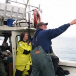 Pete pointing out birds for clients